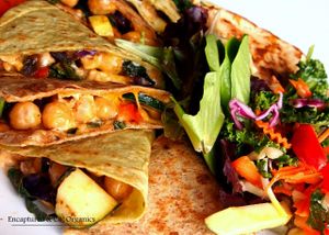 Happy Meatless Monday! I'm enjoying a Veggie & Bean Quesadilla! Grilled, Spiced, Organic Veggies, Garbanzo Beans, Chipotle Aioli, Cheddar and Mozzarella Cheeses on both a 7 Grain Flax and Spinach Tortilla!  at Sprouts Cafe in Gastonia