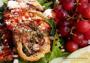 Mushroom/Kale Pastry Roll! Organic Kale, Crimini Mushrooms, Onions and Celery Sauteed, Rolled, and baked into a delicious Puff Pastry with Mozzarella and Romano Cheeses served over Mixed Greens and topped with Marinated Tomatoes w/Balsamic Drizzle!  at Sprouts Cafe in Gastonia