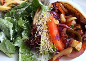 Grilled Veggie Pita today! Seasoned, Organic, Grilled Veggies on a Traditional Thick Pita with a Herby Goat Cheese spread, Fresh Sprouts, Tomato and Spring Mix!  at Sprouts Cafe in Gastonia