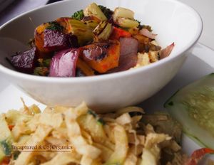 Creamy Polenta with Roasted, Seasoned Veggies & Balsamic Drizzle! Creamy Bob's Red Mill Corn Grits topped with a seasonal mix of oven roasted veggies topped with Sweet Balsamic Drizzle!  at Sprouts Cafe in Gastonia