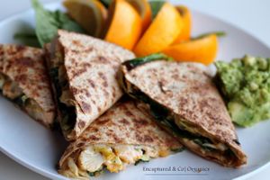 Veggie Quesadilla with spiced, grilled veggies on a 7-grain flax wrap with Melted Pepper-jack Cheese, Chipotle Aioli, and Organic Mashed Avocado!  at Sprouts Cafe in Gastonia