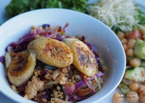 Curried Coconut Stir fry with grilled bananas! Colorful, Organic Veggies: Purple Cabbage, Curly Kale, Yellow Squash, Zucchini, Rainbow Carrots, Green Peppers & Onion with brown rice stir fried with a delicious curried coconut citrus sauce & lime!   at Sprouts Cafe in Gastonia