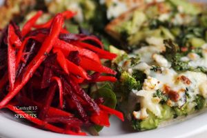 Green Veggie Pizza! Our Organic, Marinated Green Veggies including: Kale, Zucchini, Celery, Broccoli, Brussels Sprouts, and Bell Peppers on a Traditional Crust with Creamy Tangy Avocado Base and 3-cheese blend!  at Sprouts Cafe in Gastonia