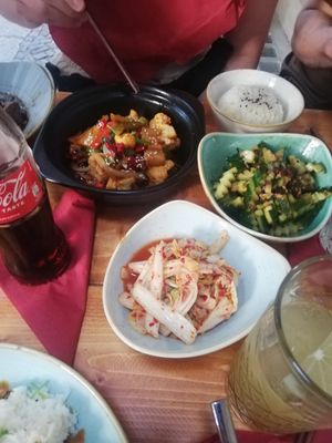 Kimchi + Cucumber Salad + something else delicious at Kamala Vegan in Berlin