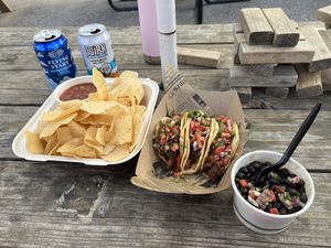 Chips & chipotle salsa, no carne asada tacos, and black beans! (N/A drinks in background came from Tap Shack)  at Cargo Cantina in North Kansas City