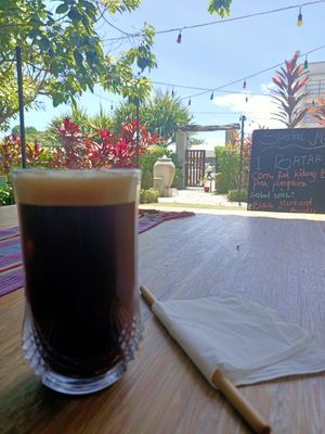 Iced coffee whilst enjoying the service at Agora Food Studio in Dili