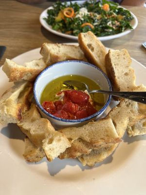 Focaccia with cashew ricotta and cherry tomatoes  at Wheat Penny Oven and Bar in Dayton