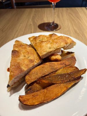 Cauli Parmesan sandwich on focaccia. This is the chicken parm sandwich veganized 🙌🏼   at Wheat Penny Oven and Bar in Dayton