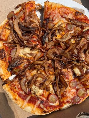 Vegan Tommaso pizza. SO GOOD!!! Those are crispy shoestring onions on top 😋   at Wheat Penny Oven and Bar in Dayton