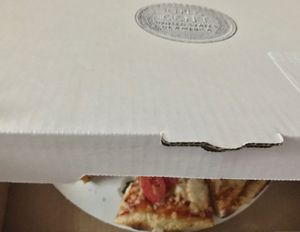 Pizza box.  at Wheat Penny Oven and Bar in Dayton