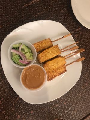 Grilled tofu saté with small salad at Veggie House in Los Angeles