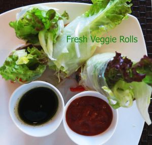 Fresh Roll : Romaine lettuce, cucumber, carrot , mung bean noodle, tofu, bean sprout, and sweet basil, wrapped with rice paper served with peanut sauce and sweet green chili sauce. at Veggie House in Los Angeles