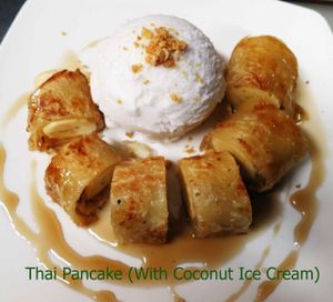 THAI PANCAKE (ROTI) COMES WITH COCONUT ICE CREAM  at Veggie House in Los Angeles