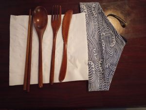 Wood utensils in cloth pouch at Takumi Cuisine in Decatur