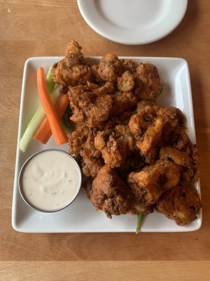 The Buffalo Cauliflower Wings are their most popular item on the menu 👅 at Sage Bistro - Cloud Kitchen in Culver City