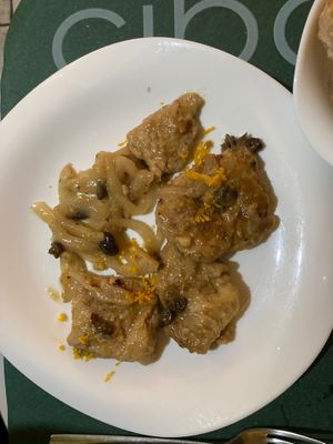 Seitan with onion and orange zest   at Cibo in Aosta