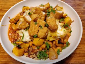 Masala curry bowl with chicken at Veggie Grill by Next Level - Downtown in Seattle