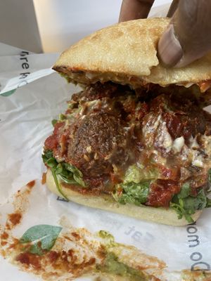 The insides of the meatball sub on ciabatta  at Veggie Grill by Next Level - Downtown in Seattle