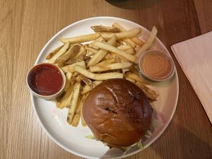 Burger with fries  at Veggie Grill by Next Level - Downtown in Seattle