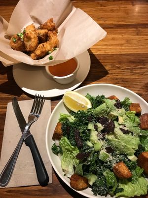 Kale Caesar and fried cauliflower  at Veggie Grill by Next Level - Downtown in Seattle