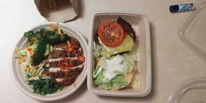 The Far East bowl with crispy chicken and The Steakhouse burger at Veggie Grill by Next Level - Downtown in Seattle