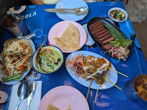 Steak, skewers, curry and papaya salad at muan in South West London