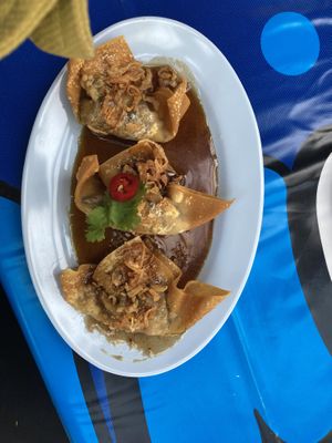 Crispy dumplings with tamarind sauce   at muan in South West London