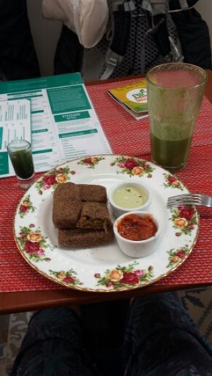 wheatgrass shot, green juice, and carrot things.  at Raw Cafe in Lima