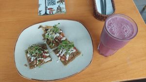 Portobello mushrooms with raw crackers and berry shake at Raw Cafe in Lima