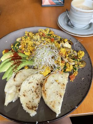 This pan de maiz muy rico tambien   at Raw Cafe in Lima