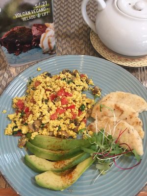 Scrambled tofu, avocado and corn bread  at Raw Cafe in Lima