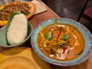Red Thai curry with tofu and vegetables and sticky rice. at Rosa's Thai in Edinburgh