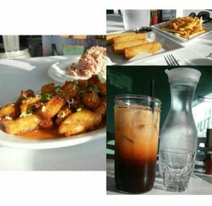 Thai iced tea, egg rolls, cheez fries, and orange chicken at My Vegan Gold in Los Angeles