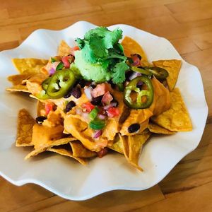 Nachos! Yummy, but light on the veggies! at My Vegan Gold in Los Angeles