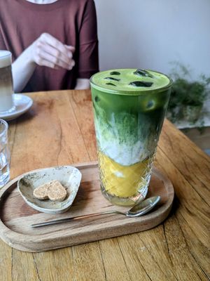Iced matcha latte with mango. Unfortunately there were no straws. at Sukha Life in Castricum