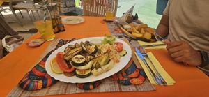 Vegan grill meza (grilled veggies, crispers, rice, sauce) at Bambo in Pula