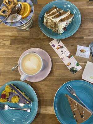 carrot cake, blueberry/cashew cake, snickers cake, coffee from next door: Avocado Spot, and apple cinnamon tea  at Avocado Vegan Bistro in Gdansk