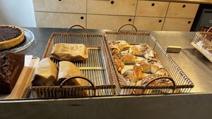 More options at the counter, including “St. Martin’s Croissant"  at DAMKA • cafè & bakery in Krakow