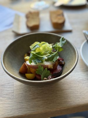 Tomato and pluot salad with focaccia   at Eden Hill Restaurant in Seattle