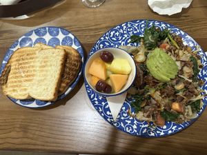 Vegan hash, fruit cup, and white breadd  at Honey Berry Pancakes and Cafe in Richardson