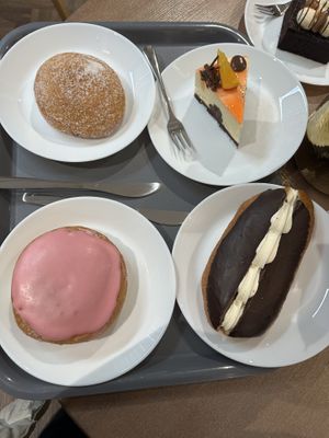 From top left: pikkumunkki, chocolate orange cheesecake, mustikkavaniljamunkki, and piispanmunkki  at Kosken Leipomo - Hansa in Turku