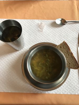 Lentil soup, tea, and bread made up the first course. The soup needed more flavor.  at O Oriente no Porto in Porto
