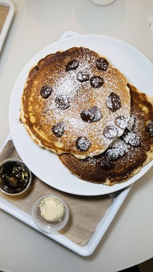 Chocolate Chip Pancakes: whipped maple butter. pure maple syrup.   at chloe in New York City