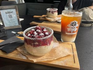 Rice pudding with cherries and iced coffee with oat milk at Geeske & Der Swarte Roelf in Borkum