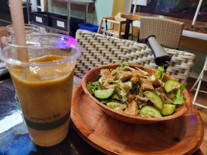 The orange Creamsicle shake and the Caesar salad special. at The Veli  in Pahoa