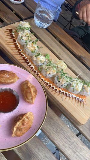 Sweetcorn roll and kimchi dumplings   at Ima in London