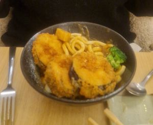 Curry noodles and breaded aubergine at Ima in London