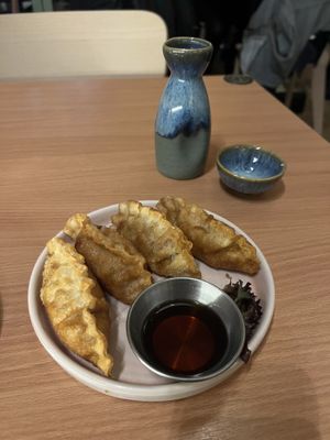 Kimchi gyoza and yuzu sake!  at Ima in London