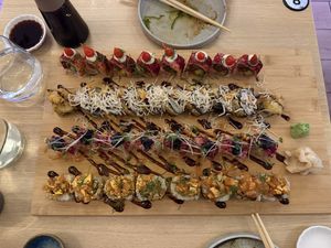 Spicy sundried tomato tuna, Snow hiratake mushroom tempura, mistletoe miso tempura black cod, konnyaku salmon tartare   at Ima in London