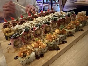 Spicy sundried tomato tuna, Snow hiratake mushroom tempura, mistletoe miso tempura black cod, konnyaku salmon tartare   at Ima in London